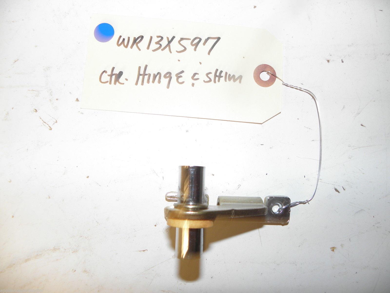 GENERAL ELECTRIC REFRIGERATOR WR13X597 CENTER HINGE & SHIM USED PART F/S GENERAL ELECTRIC REFRIGERATOR WR13X597 CENTER HINGE & SHIM USED PART F/S